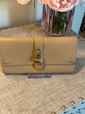Elegant vintage Chloe Tan studded Leather Wallet with lock charm
